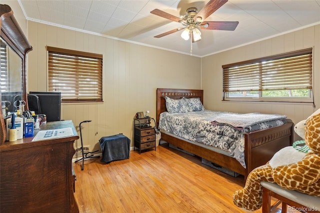 2876 S Wolff St, Denver, CO 80236 - bedroom featuring crown molding, wood finished floors, and a ceiling fan