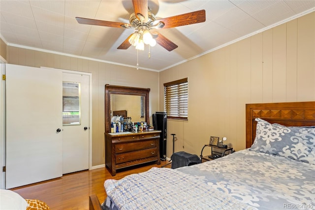 2876 S Wolff St, Denver, CO 80236 - bedroom with crown molding, wood finished floors, and ceiling fan