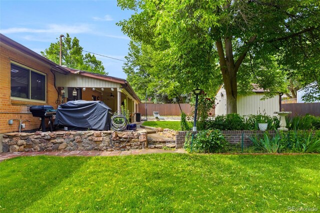 2876 S Wolff St, Denver, CO 80236 - view of yard featuring a shed
