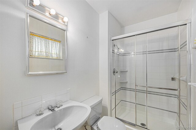 5502 E Center Ave, Denver, CO 80246 - full bathroom featuring a stall shower