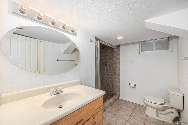 5502 E Center Ave, Denver, CO 80246 - full bathroom featuring vanity, a tile shower, a textured ceiling, tile patterned floors, and recessed lighting