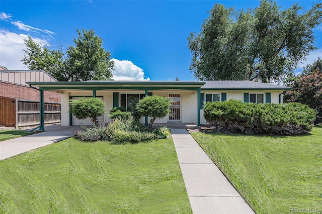 5502 E Center Ave, Denver, CO 80246 - single story home with concrete driveway, brick siding, and an attached garage