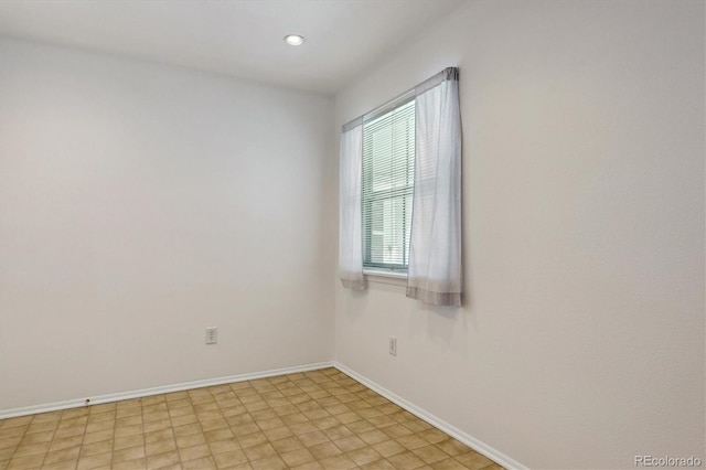 7275 S Gaylord St Unit I09, Littleton, CO 80122 - spare room with baseboards and light floors