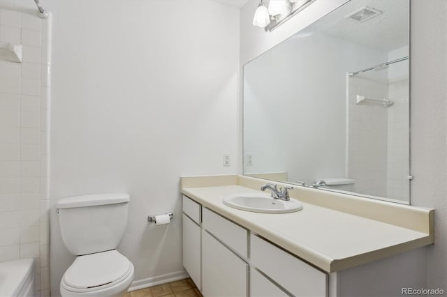 7275 S Gaylord St Unit I09, Littleton, CO 80122 - full bathroom featuring toilet, vanity, tile patterned floors, and baseboards