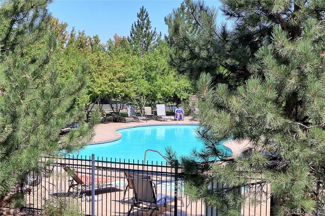 11207 Osage Cir Unit B, Northglenn, CO 80234 - community pool with a patio
