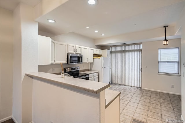 kitchen featuring light tile patterned flooring, white cabinetry, decorative light fixtures, kitchen peninsula, and stainless steel appliances