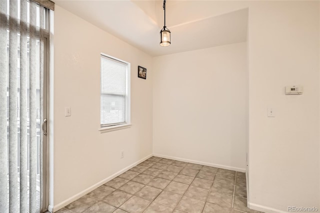 view of tiled spare room