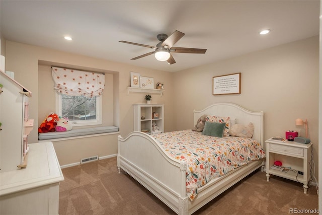 bedroom featuring dark colored carpet, visible vents, and recessed lighting