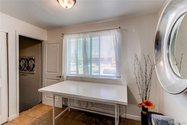 interior space featuring light tile patterned floors