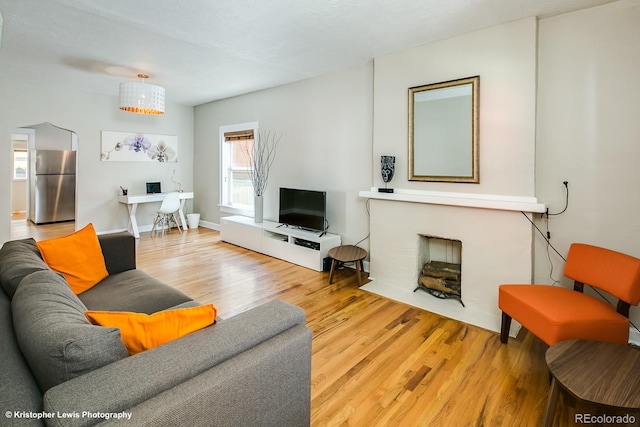 284 S Lafayette St, Denver, CO 80209 - living room featuring wood finished floors