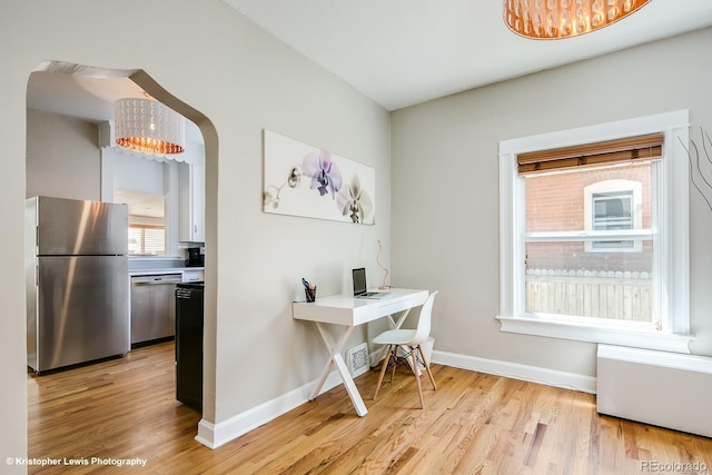 284 S Lafayette St, Denver, CO 80209 - office featuring light wood finished floors, radiator, baseboards, and a chandelier