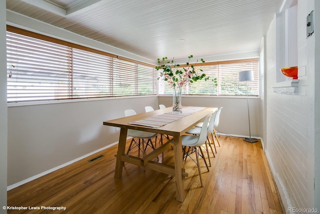 284 S Lafayette St, Denver, CO 80209 - dining area with light wood finished floors and baseboards