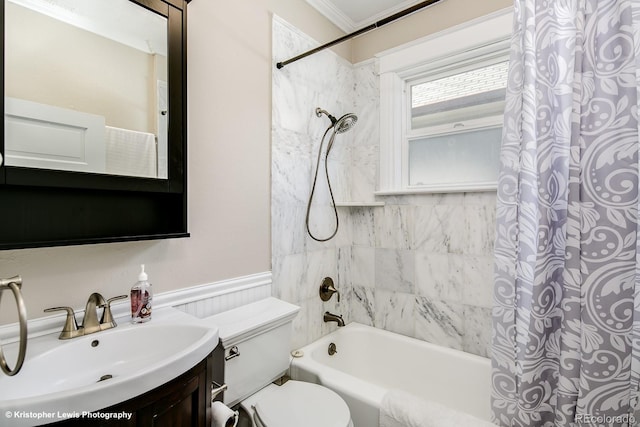 284 S Lafayette St, Denver, CO 80209 - full bath with shower / bath combo with shower curtain, vanity, toilet, a wainscoted wall, and ornamental molding