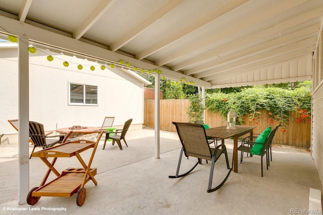 284 S Lafayette St, Denver, CO 80209 - fenced backyard with outdoor dining area and a patio area