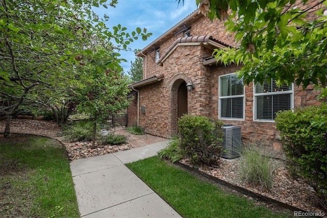 doorway to property with central AC