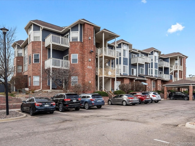 2428 W 82nd Pl Unit 2D, Westminster, CO 80031 - view of apartment building / complex with uncovered parking