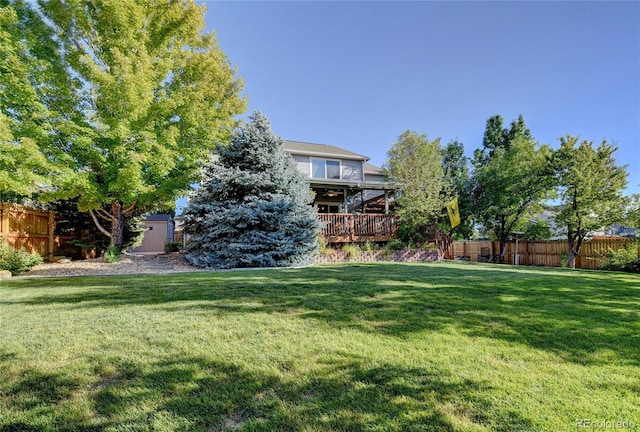 view of yard featuring a deck