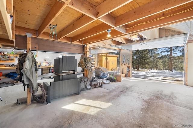 garage featuring a garage door opener