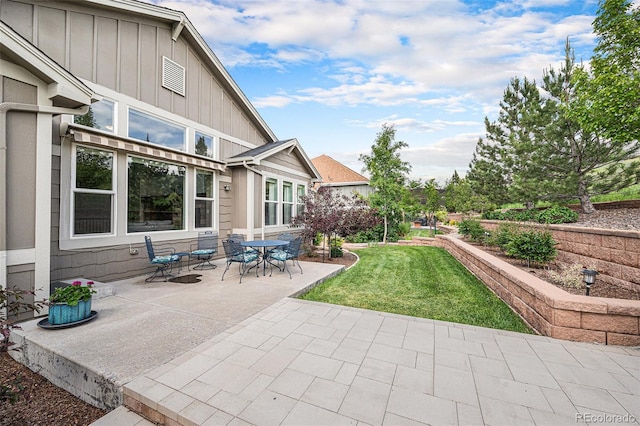 13942 W 87th Dr, Arvada, CO 80005 - view of patio / terrace with outdoor dining area