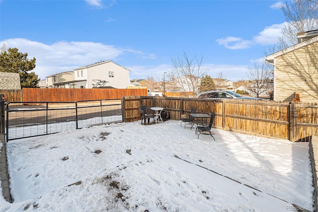 view of yard covered in snow