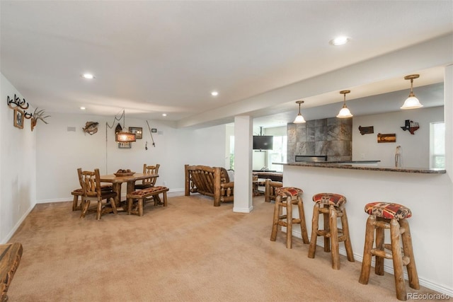 2105 Baguette Dr, Castle Rock, CO 80108 - dining area with recessed lighting, healthy amount of natural light, light colored carpet, and bar area