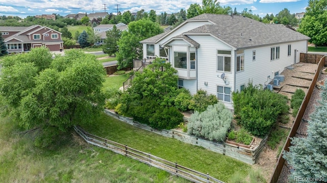 2105 Baguette Dr, Castle Rock, CO 80108 - rear view of property with a shingled roof