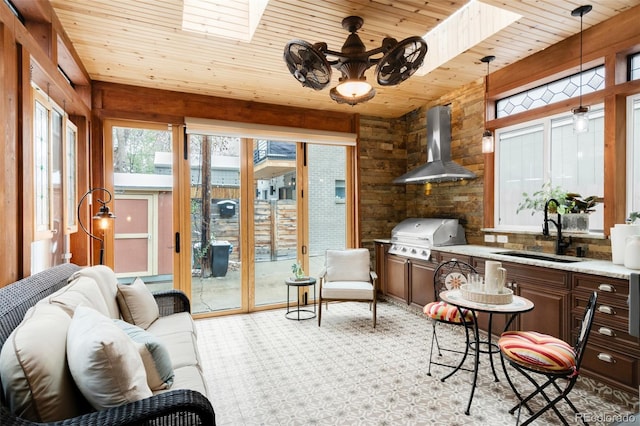 3147 Vallejo St, Denver, CO 80211 - sunroom with a skylight and a sink
