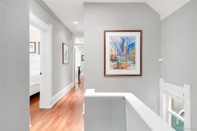 3147 Vallejo St, Denver, CO 80211 - corridor with light wood-type flooring, an upstairs landing, recessed lighting, baseboards, and healthy amount of natural light