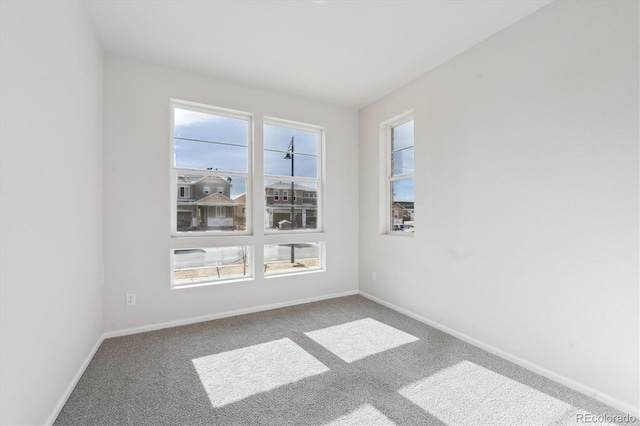 view of carpeted spare room