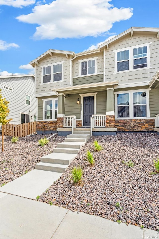 13568 E 111th Ave, Commerce City, CO 80022 - view of front of property with stone siding and covered porch