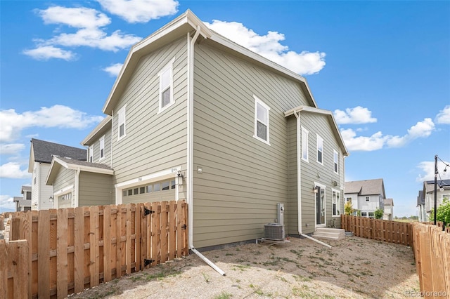 13568 E 111th Ave, Commerce City, CO 80022 - view of home's exterior with a cooling unit