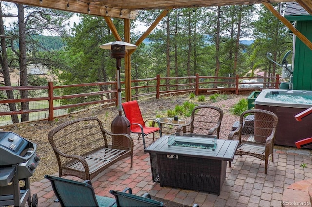 517 Crystal Peak Rd, Florissant, CO 80816 - fenced backyard featuring an outdoor fire pit, a grill, and a patio