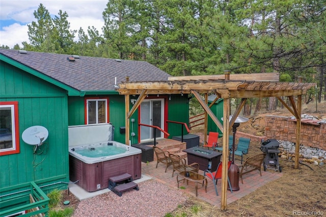 517 Crystal Peak Rd, Florissant, CO 80816 - view of patio / terrace with a hot tub, grilling area, a fire pit, and a pergola