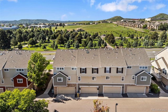 1522 Chimney Peak Dr, Castle Rock, CO 80109 - aerial view of residential area featuring a mountainous background
