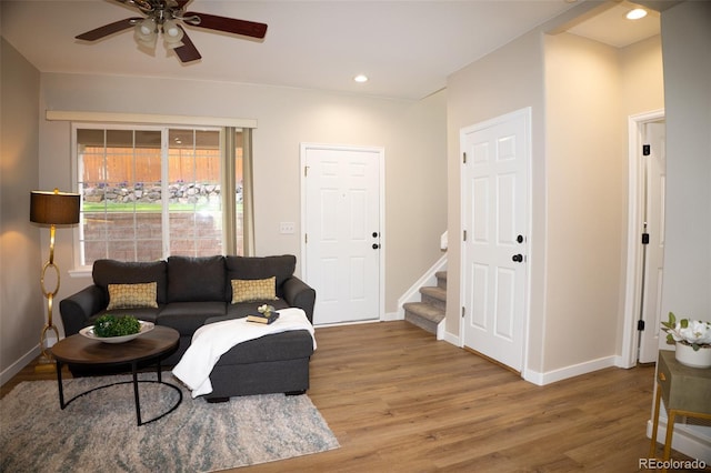 6845 S Webster St Unit E, Littleton, CO 80128 - living room with wood finished floors, stairs, ceiling fan, and recessed lighting