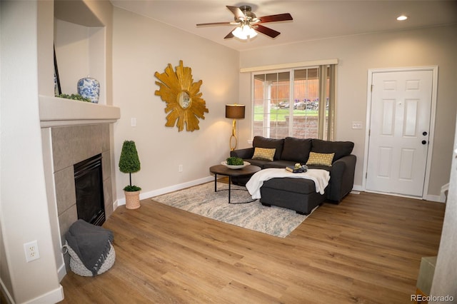 6845 S Webster St Unit E, Littleton, CO 80128 - living room featuring ceiling fan, wood finished floors, a fireplace, and recessed lighting