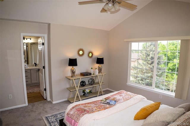 6845 S Webster St Unit E, Littleton, CO 80128 - carpeted bedroom featuring multiple windows, ensuite bath, high vaulted ceiling, and ceiling fan