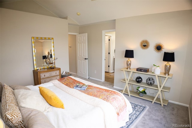 6845 S Webster St Unit E, Littleton, CO 80128 - carpeted bedroom with vaulted ceiling and baseboards