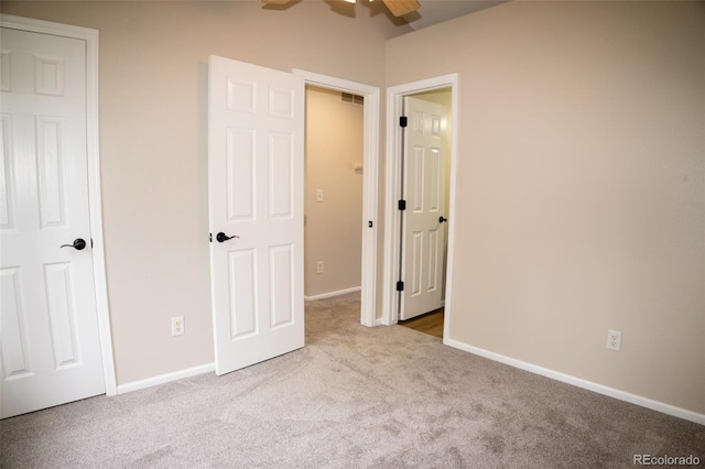 6845 S Webster St Unit E, Littleton, CO 80128 - unfurnished bedroom featuring carpet floors and baseboards