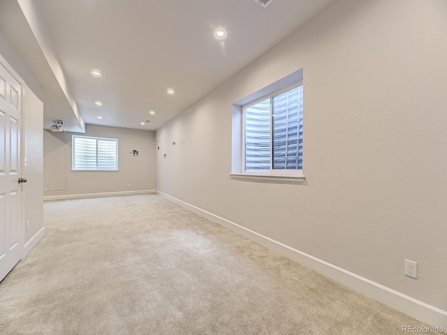 917 White Leaf Cir, Castle Rock, CO 80108 - below grade area with light colored carpet, baseboards, and recessed lighting