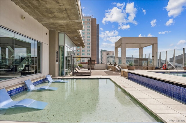 view of pool with a patio area