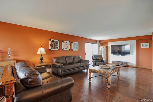 3131 E Alameda Ave Unit 704, Denver, CO 80209 - living area with wood finished floors and baseboards