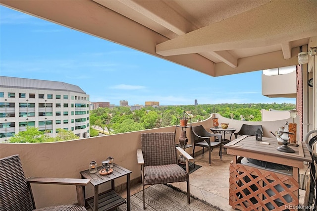 3131 E Alameda Ave Unit 704, Denver, CO 80209 - balcony featuring an outdoor living space