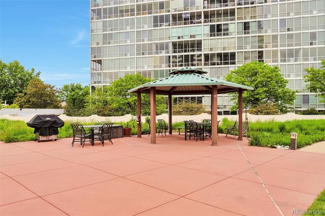 3131 E Alameda Ave Unit 704, Denver, CO 80209 - view of patio / terrace with a gazebo, grilling area, and outdoor dining area