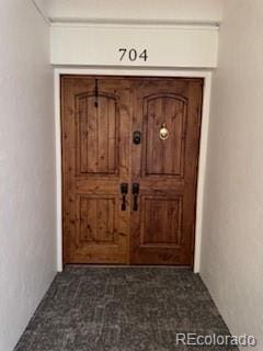 3131 E Alameda Ave Unit 704, Denver, CO 80209 - entrance to property with stucco siding