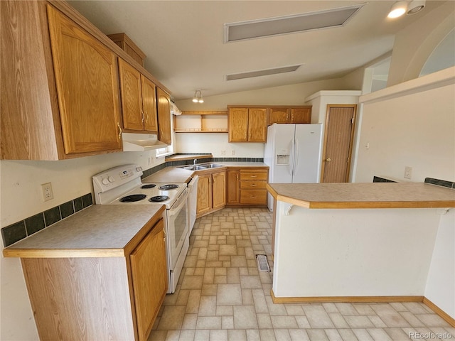 631 Arrowhead Dr, Jefferson, CO 80456 - kitchen featuring white appliances, under cabinet range hood, lofted ceiling, a sink, and brick patterned flooring