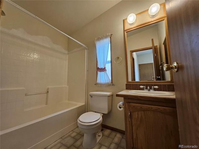 631 Arrowhead Dr, Jefferson, CO 80456 - full bath featuring toilet, vanity, shower / bath combination, and baseboards