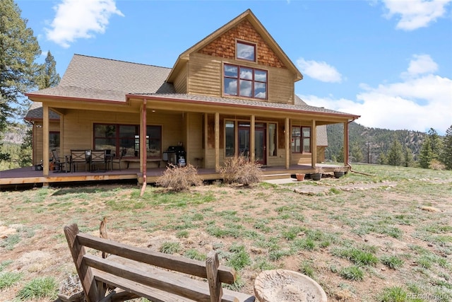 582 Buddy Rd, Bailey, CO 80421 - back of house featuring a yard