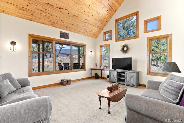 582 Buddy Rd, Bailey, CO 80421 - carpeted living area with a healthy amount of sunlight, baseboards, wood ceiling, and high vaulted ceiling