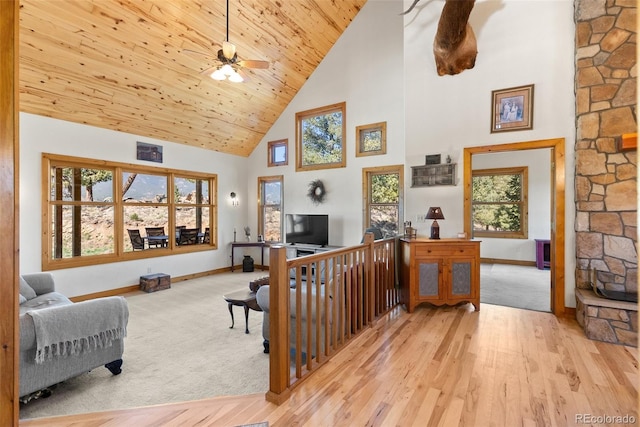 582 Buddy Rd, Bailey, CO 80421 - living room featuring ceiling fan, high vaulted ceiling, baseboards, wood finished floors, and wood ceiling